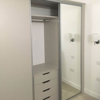 3 Double Wardrobe with sliding doors and chest of drawers.