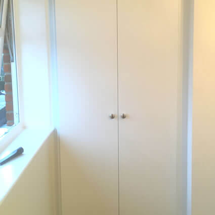 2 Double Wardrobes in Satin White with Venice style doors.