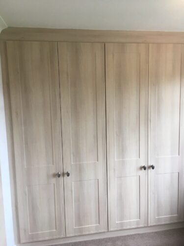 Two double and one single fitted wardrobesa
